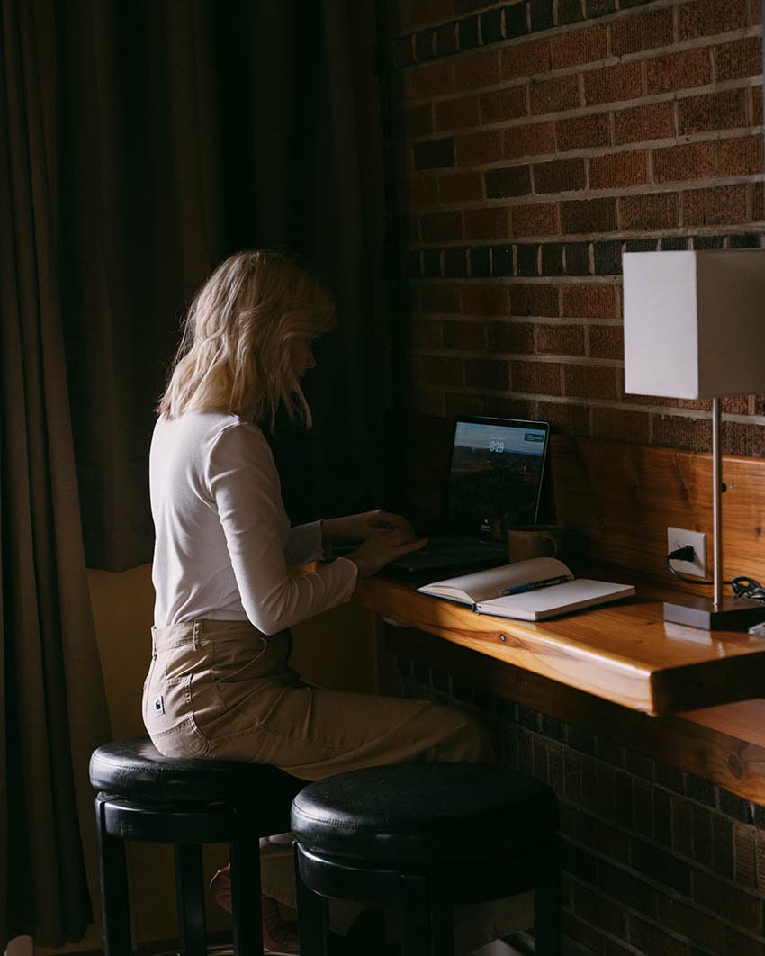 Woman working at a laptop